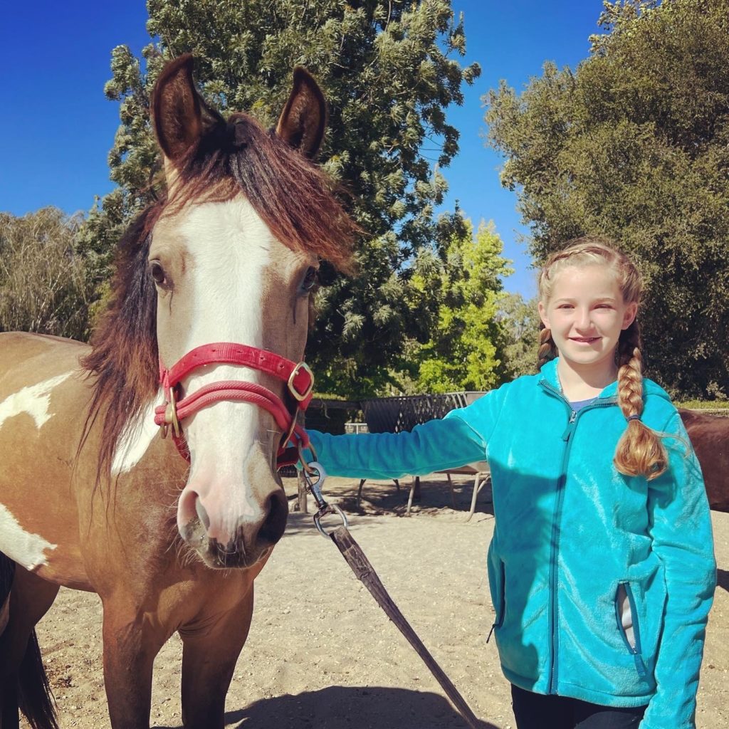 Zion at Flag Is Up Farm with WBF Youth Ambassador, Jocelyn M. during Monty Roberts' "The Movement" event this June 2022