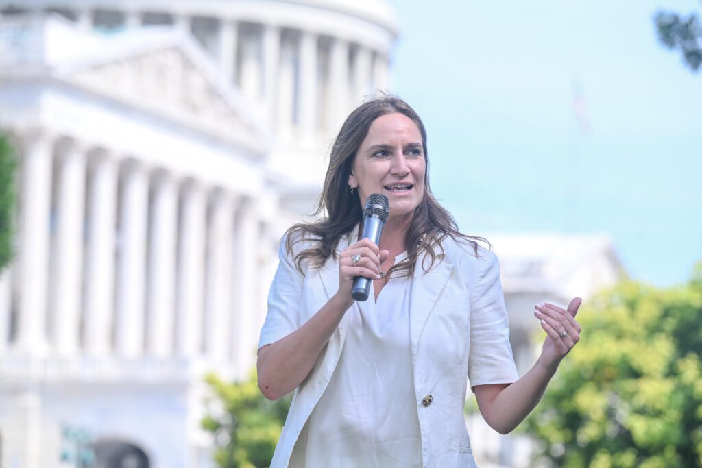 Ashley Avis Gives a Speech at A Cry for the Wild Event
